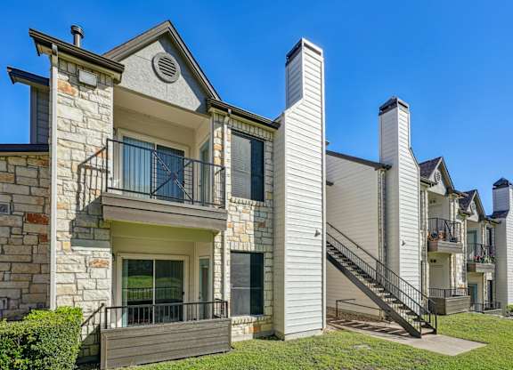 Exteriors of our cozy apartments at On the Green apartments in Austin, TX