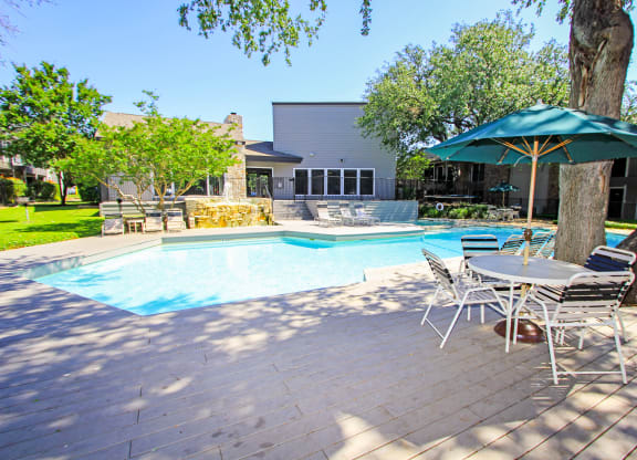 a pool view in a sunny dat at Westdale Parke in Austin, TX