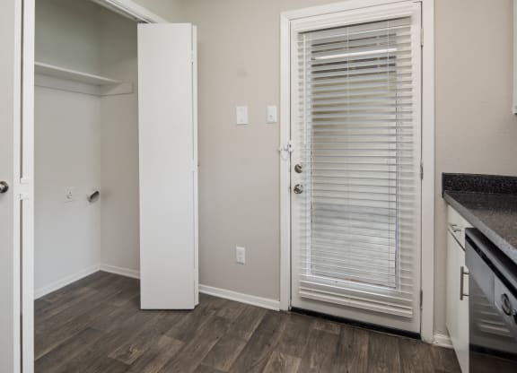Laundry Closet in Kitchen at Preston Villas Apartment Homes, Dallas, Texas, TX