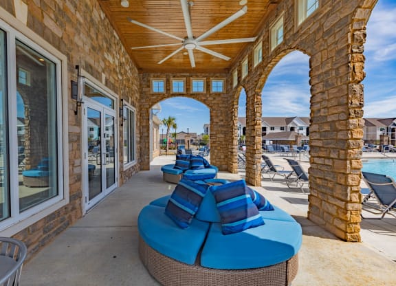 Outdoor Area by Pool at Parkside Grand Apartments in Pensacola, FL