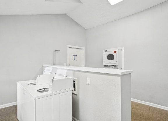 Convenient and efficient laundry area at Pine Village North in Smyrna, GA
