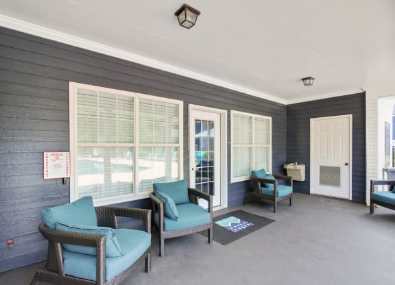 a patio with chairs and a table at Grand Reserve at Columbus Apartments in Columbus, Georgia, GA