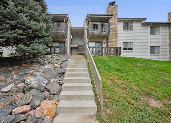 Reflections of Cherry Creek in Aurora, CO stairs leading up to the exteriors of the apartment buildings