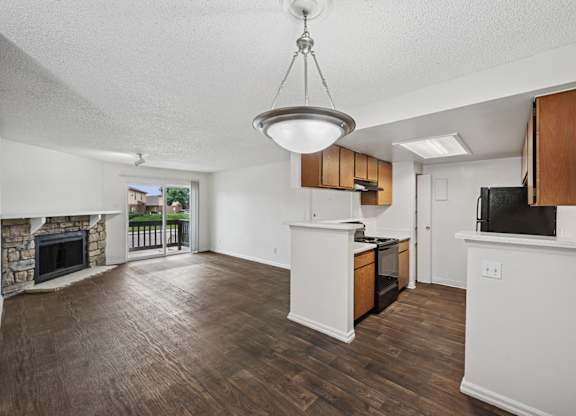 Reflections at Cherry Creek in Aurora, CO kitchen and living room