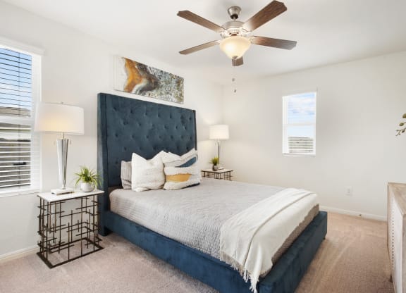 Bedroom with blue mattress frame at Beacon at Ashley River Landing in Summerville, SC