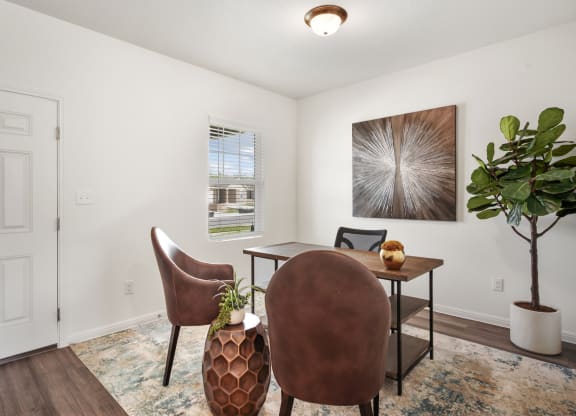 the dining area with chairs  and bright light