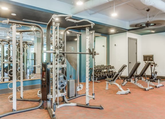 Fitness Center Interior with Exercise Machines at St. Elmo Apartment in Austin, TX