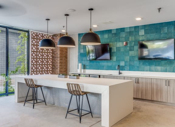 Relaxing Outdoor Lounge Area with Comfortable Seating at St. Elmo Apartment in Austin, TX