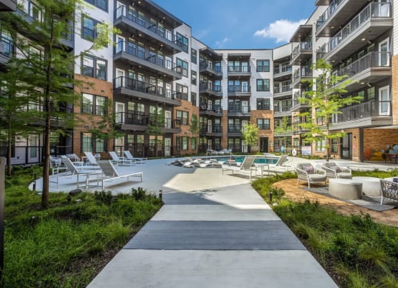 Modern Pool Deck Design at St. Elmo Apartment in Austin, TX