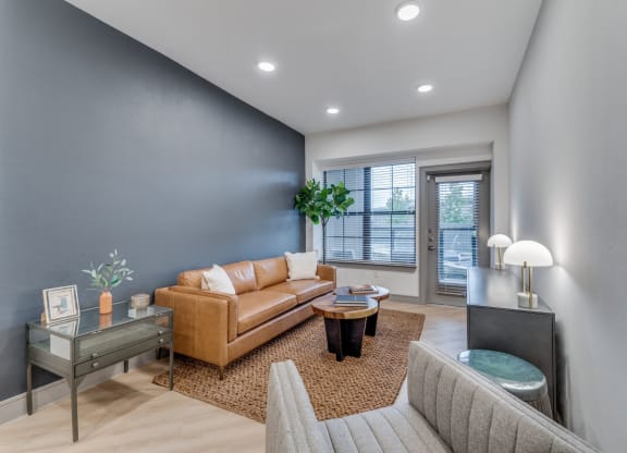 Inviting Living Room Space with Cozy Furnishings at St. Elmo Apartment in Austin, TX