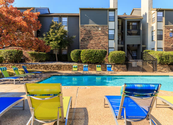 Outdoor pool area  at The Summit Apartments in Mesquite, Texas, TX