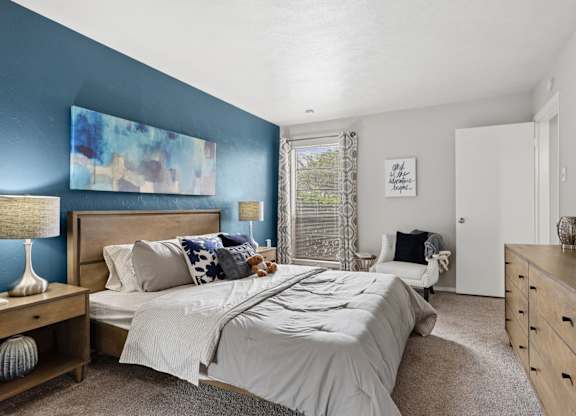 Model unit bedroom at The Summit in Mesquite, TX