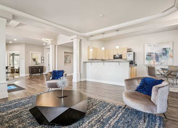 Clubhouse seating and kitchen area at The Madison apartments in Olympia, WA