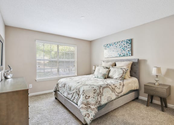 A Bedroom with a bed and a window at Wellington Ridge in Lawrenceville, GA