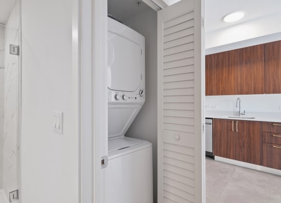 a laundry room with a washer and dryer