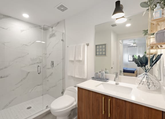 Bathroom with walk-in shower in A2 Floor Plan at Westgate on University in Lauderhill, FL