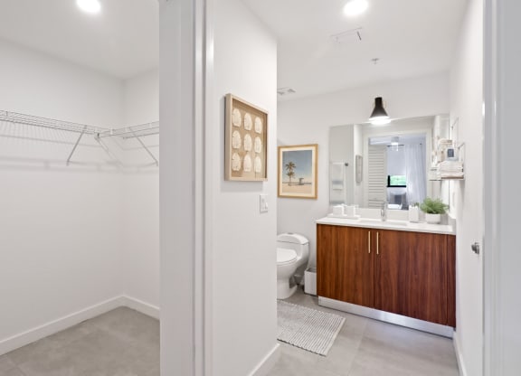 Bathroom entryway in B1 Floor Plan with walk-in closet at Westgate on University in Lauderhill, FL