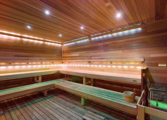 Steam Room with wooden benches at Westgate on University in Lauderhill, FL