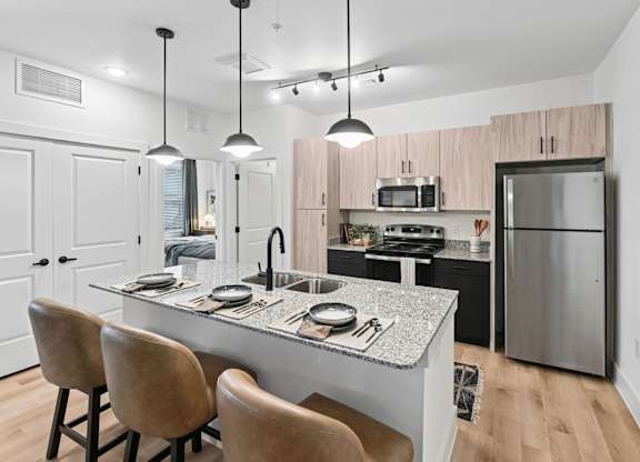 Kitchen of Model Unit at Whispering Pines in Euless, TX