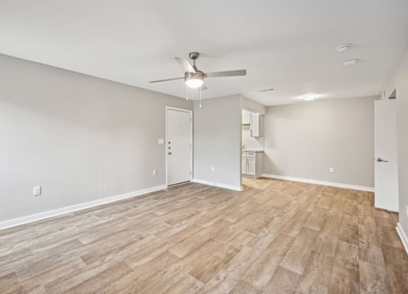 Living room area in the D5 floor plan at Windridge On The Parkway Apartments in Dallas, TX