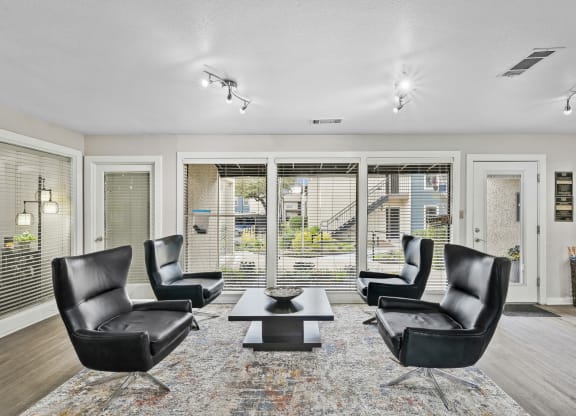 Waiting area seating of leasing office at Windridge in Dallas, TX