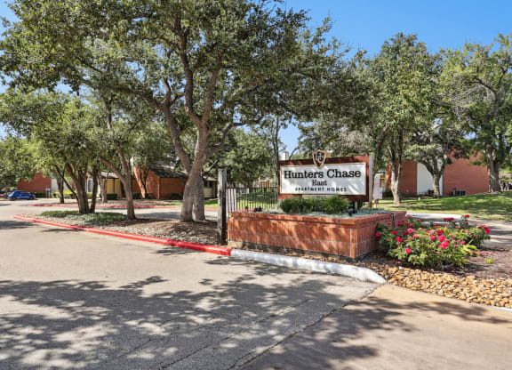 Property signage at the entrance area at Hunters Chase in Austin, TX