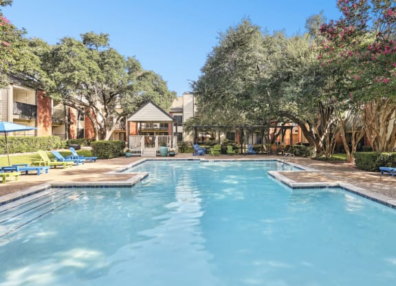 Sparkling swimming pool at Hunters Chase Apartments in Austin, TX