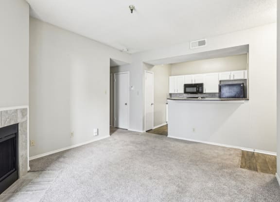 A1 floor plan living room and kitchen at Jefferson Creek Apartments in Irving, TX.