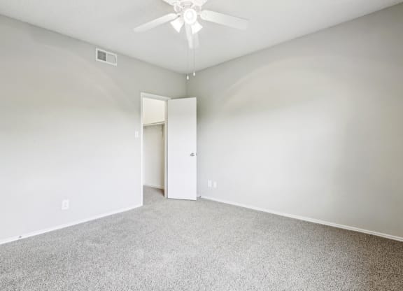 A2 floor plan bedroom with ceiling fan at Jefferson Creek Apartments in Irving, TX.