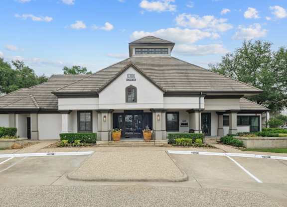 Exterior view of the leasing office for Jefferson Place apartments in Irving, TX