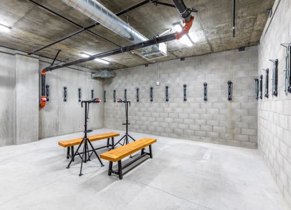 a large storage room with benches and a table in it