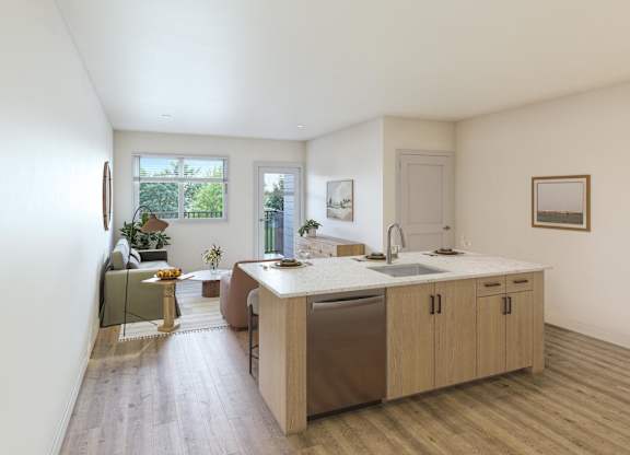 A kitchen with a sink, a window, and a dining table.