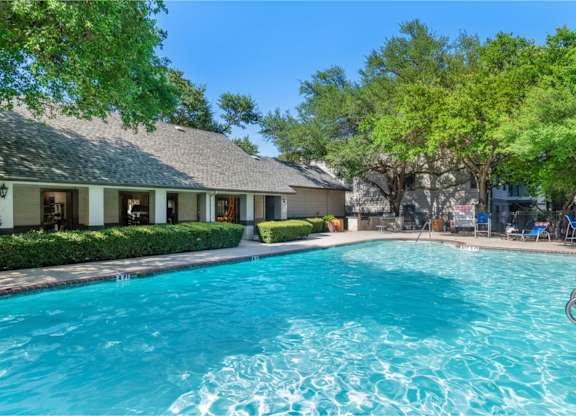 Large resort style swimming pool with surrounding deck at Radius at the Domain Apartments, Austin, Texas