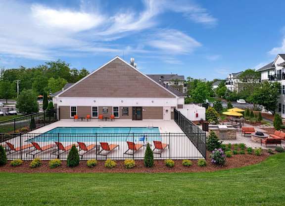 A house with a pool in the backyard.