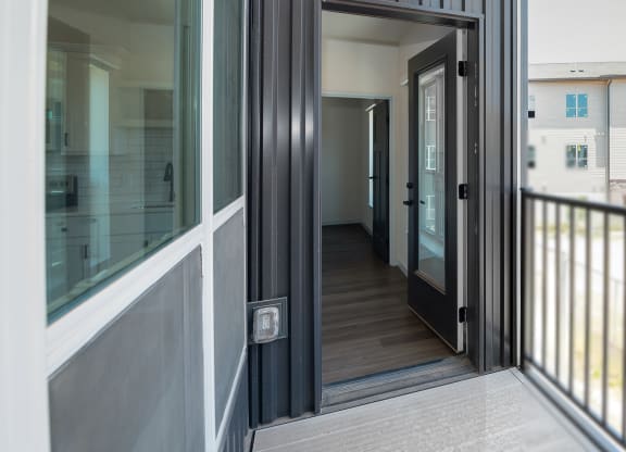 a view of the corridor from the front door of a condo at The Crossings  at Windsong, Prescott Valley