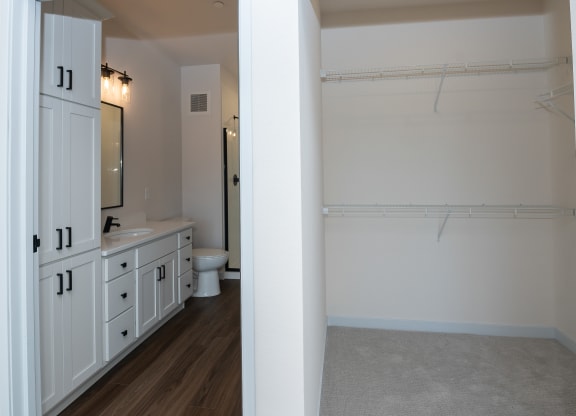 a view of a bathroom with a shower and sink and a toilet at The Crossings  at Windsong, Prescott Valley, 86314