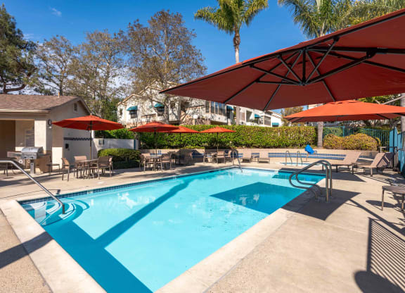 Ventura, CA Apartments Near Walmart - Cypress Meadows - Pool with Jacuzzi and Sun Lounge Chairs