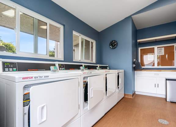 A laundry room with a washer and dryer.
