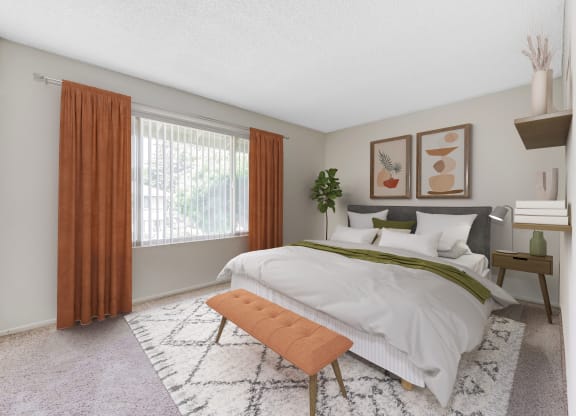 Goleta, CA, Apartments Near Costco - Encina Meadows - Bedroom With Large Window, Wall Art, White Bedding, and Green Accent Throw.