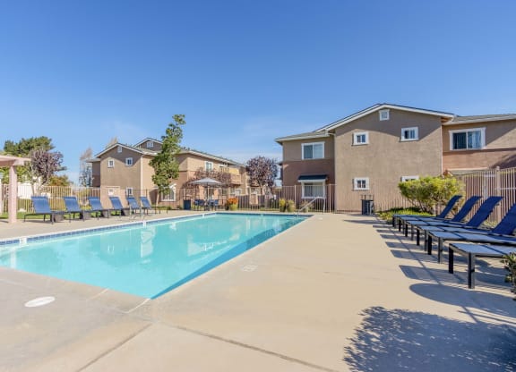 our apartments have a resort style pool with lounge chairs