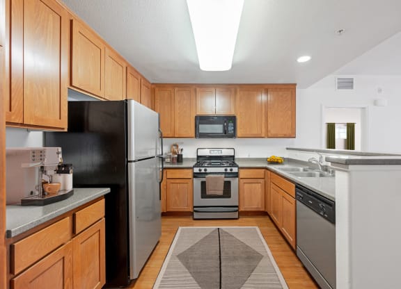 Apartments for Rent in Ventura, CA - Ralston Courtyards - Kitchen with Custom Wood Cabinets and Dishwasher