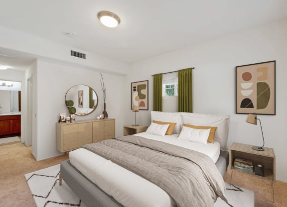 Apartments Near Trader Joes - Ventura, CA - Ralston Courtyards - Master Bedroom with High Ceilings and Carpeting