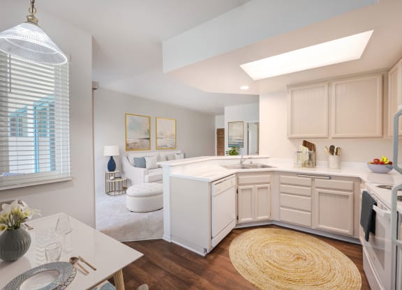 a kitchen and living room in a 555 waverly unit