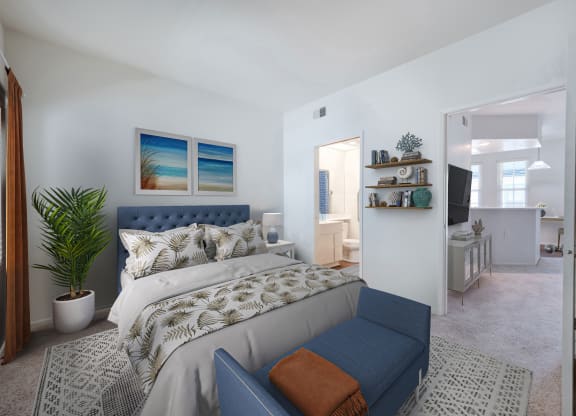 a bedroom with a bed and a couch in a 555 waverly unit