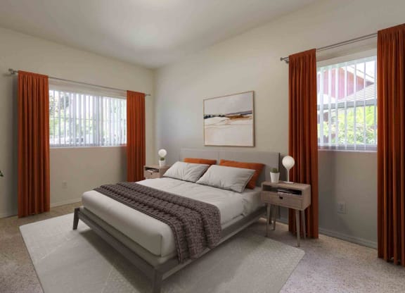Dog-Friendly Apartments in Goleta, CA - Sumida Gardens - Bedroom with Plush Carpeting, Large Bed, Nightstands with Lamps, Wall Art, and Windows.