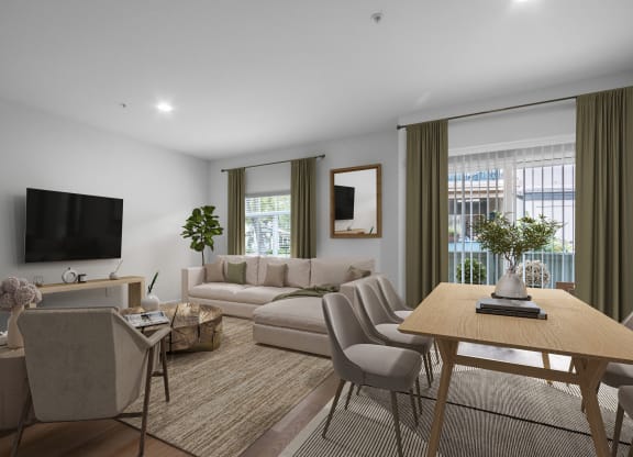 a living room with a couch and a table and a tv