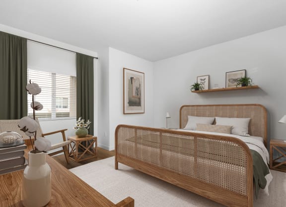 a bedroom with a bed and a large window