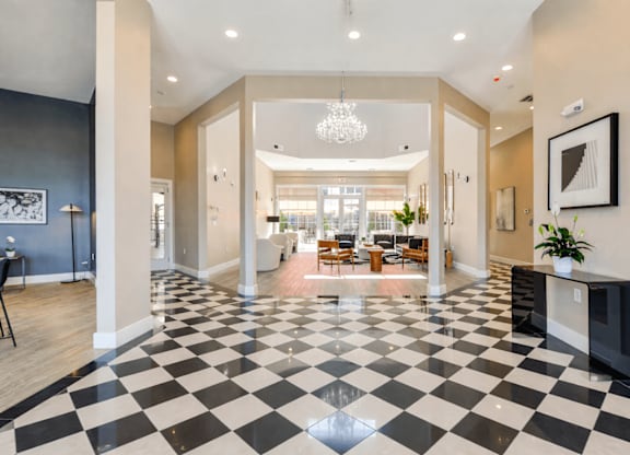 A black and white checkered floor in a spacious room.