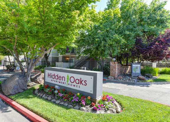 Community Entrance with Sign at Hidden Oaks Apartments, Citrus Heights, California