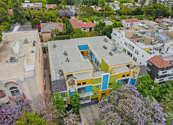 Ariel drone shot over the top of the Croft Plaza  community,at Croft Plaza Apartments, California